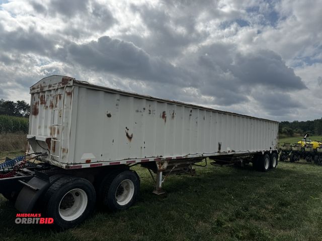 Lot 1-19728 - 1987 CPS Grain Semi-Trailer 2' bottom, 2-hopper, 42' long bottom grain trailer, with manual landing ...