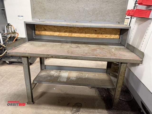 Lot 1-1911 - (1) 60" width x 32" height x 30" depth steel work bench with lower shelf and mounted 12" tall x 10.5...