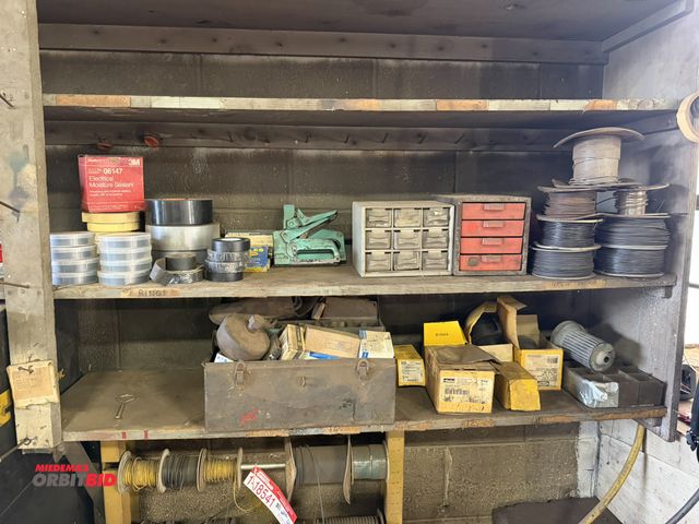 Lot 1-18542 - Contents of 2 shelves, includes assorted duct tape, electrical tape, (2) hand staplers with staples,...