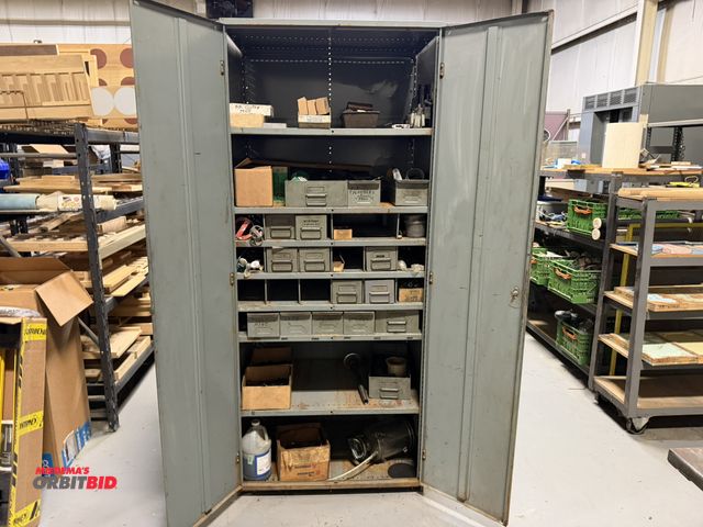 Lot 1-18619 - (1) 2-door metal storage cabinet, 36" wide, with contents, includes work holding tooling, shim stock...