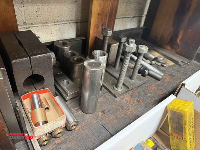 Lot 1-6380 - Large lot of assorted lathe tool holders, work holding tooling, bars, and more.
