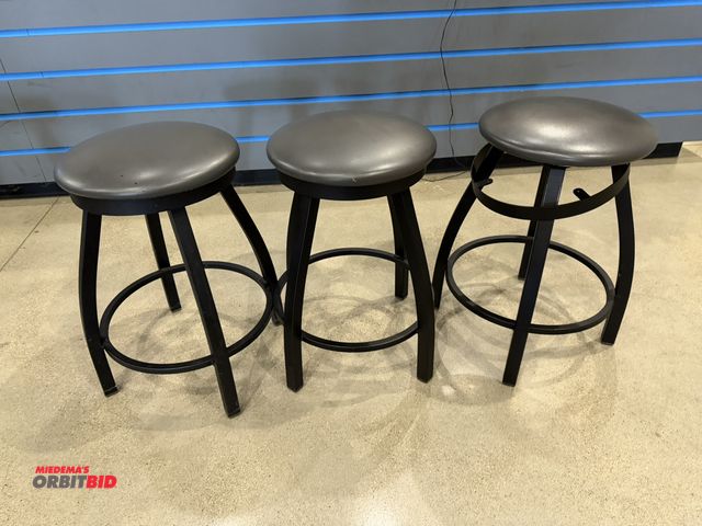 Lot 1-11158 - (3) 24" tall metal framed swivel top bar stools with vinyl padded seats