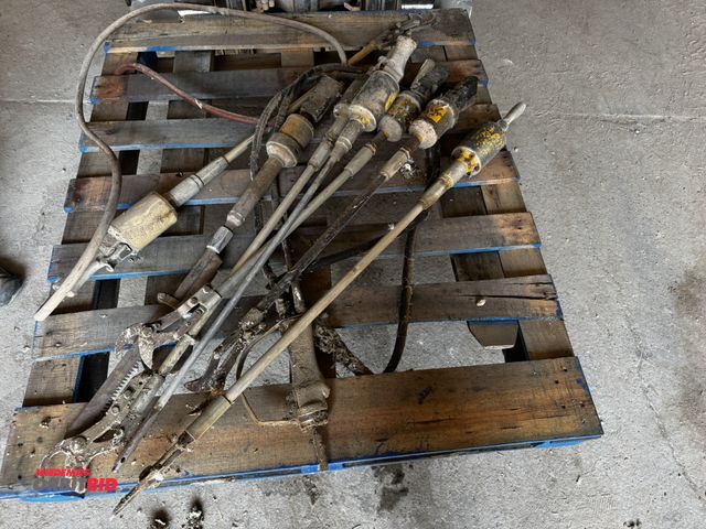 Lot 1-6990 - Lot of (5) assorted pneumatic tree loppers, and (1) pneumatic saw, and more.