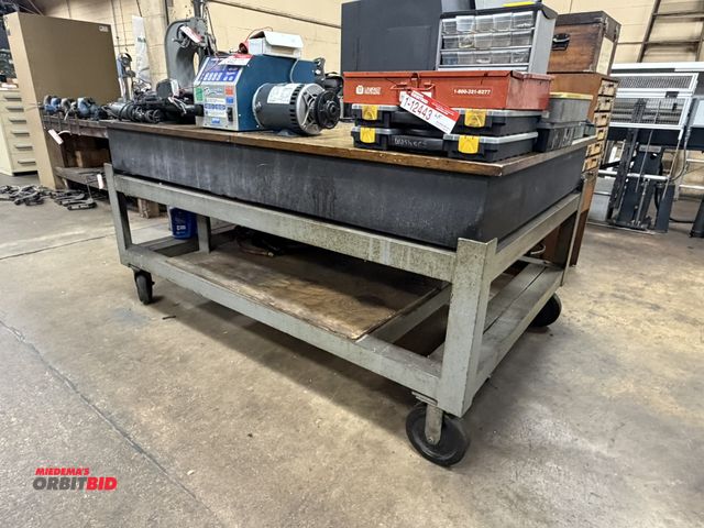 Lot 1-12444 - (1) granite setup/surface table with heavy duty steel base (table only).