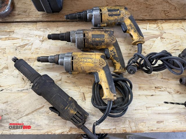 Lot 1-1312 - Lot of assorted DeWalt tools, includes (2) model DW268 VSR drivers, (1) unknown model VSR driver, an...