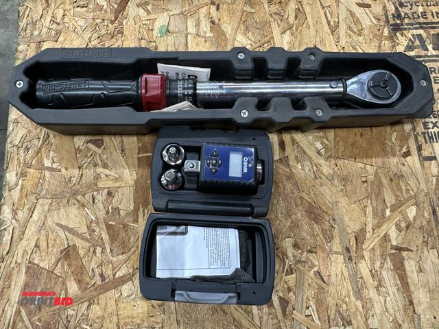 Lot 1-550 - (1) Craftsman 3/8" torque wrench, and (1) Quinn digital 1/2" torque wrench with adapters.