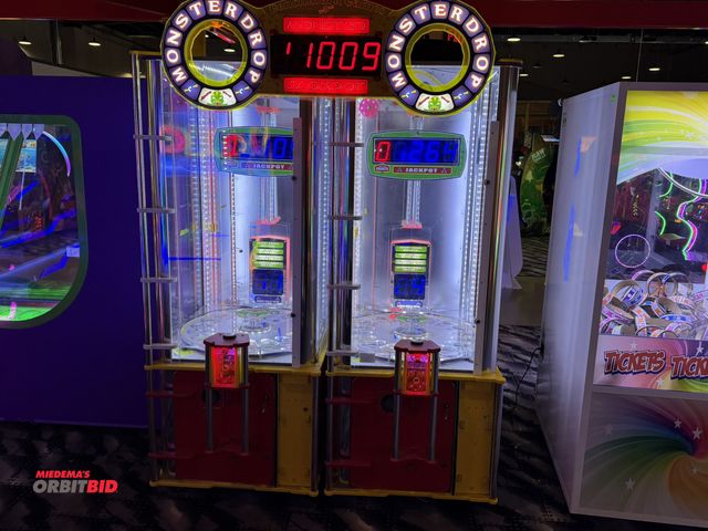 Lot 1-11239 - (2) 2011 Benchmark Monster ball drop game, 115V, 1 cabinet S/N of 115-3160A &amp; 115-3160B, electro...