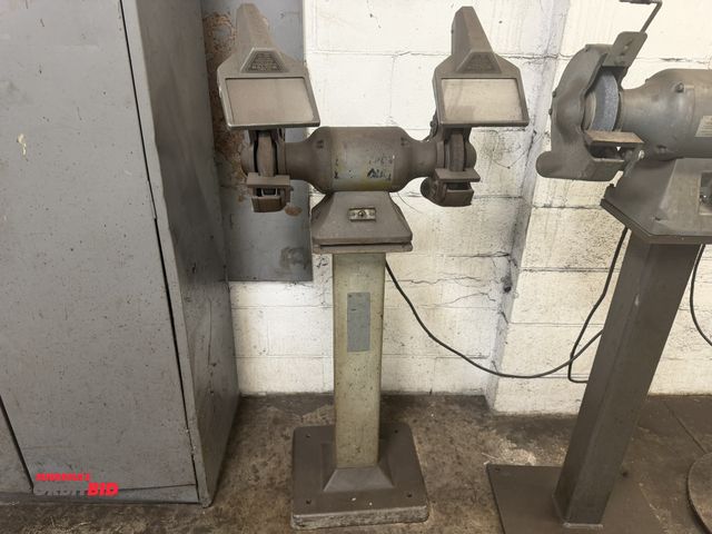 Lot 1-6250 - (1) 6" bench grinder with lighted overhead guards, mounted to a Baldor 33" tall heavy duty steel bas...