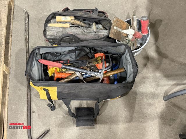 Lot 1-18566 - Lot of assorted hammers, pickaxes, pry bars, hatchets, masonry tools, and miscellaneous other items.