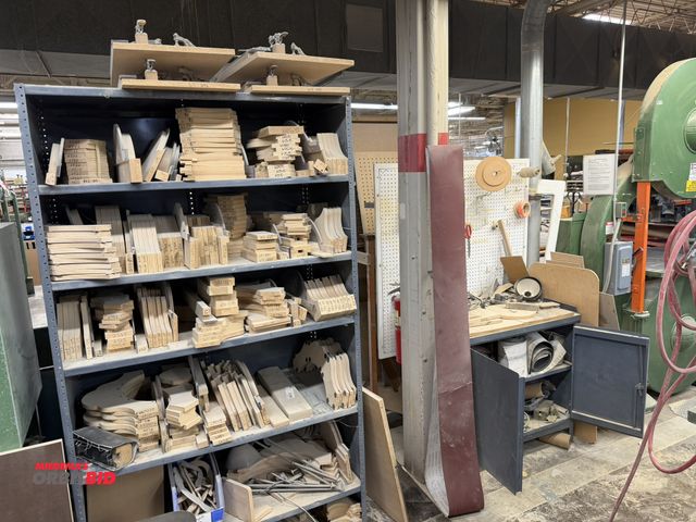 Lot 1-16488 - (1) adjustable metal shelving unit, 48" x 24" x 85" tall with assorted cut wood pieces, and 2-door m...