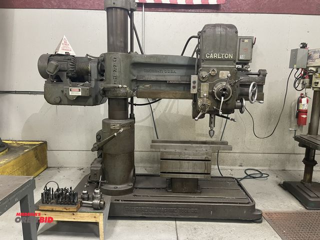 Lot 1-19252 - (1) Carlton radial arm drill, 4' arm, 9" column, slotted Tombstone style block, S/N 3314, 22 1/4" x ...