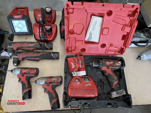 Lot 1-14157 - Lot of Milwaukee 12V cordless tools, including (2) Cat #2462-20, 1/4" hex impact drivers, (1) Cat #2...