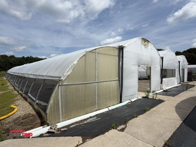 Lot 1-9983 - (1) 100' wide x 132' long 4-gutter greenhouse, 2 manual aluminum roll up sides, (3) 32" exhaust fans...
