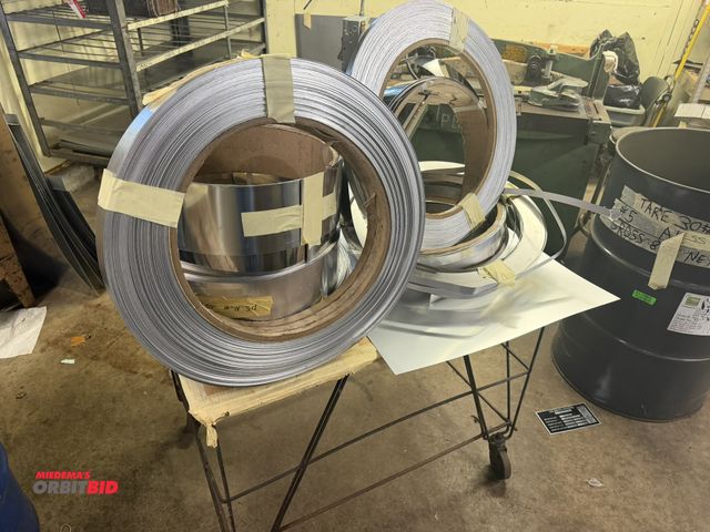 Lot 1-18800 - (1) 36" length x 27" height x 25" depth wire form cart with assorted rolls of aluminum and stainless...