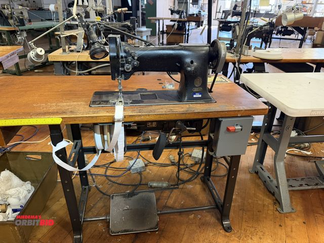 Lot 1-4676 - (1) Singer, model 112-115, commercial sewing machine with Singer power table, 1/2 HP, 3 phase motor,...