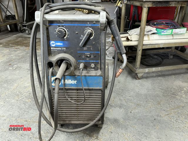 Lot 1-17760 - (1) Miller Millermatic 210 wire welder, S/N LC387216 (200/230V, single phase input), includes helmet...