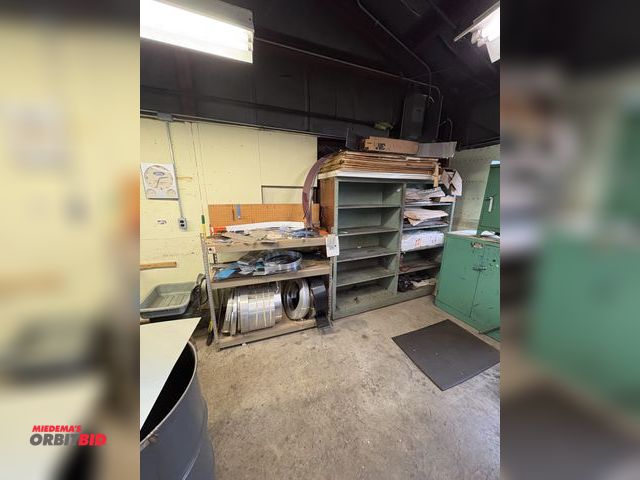 Lot 1-18624 - Lot of shelving with contents included.