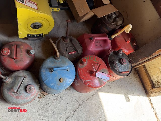 Lot 1-3227 - (8) Assorted gas cans and funnels