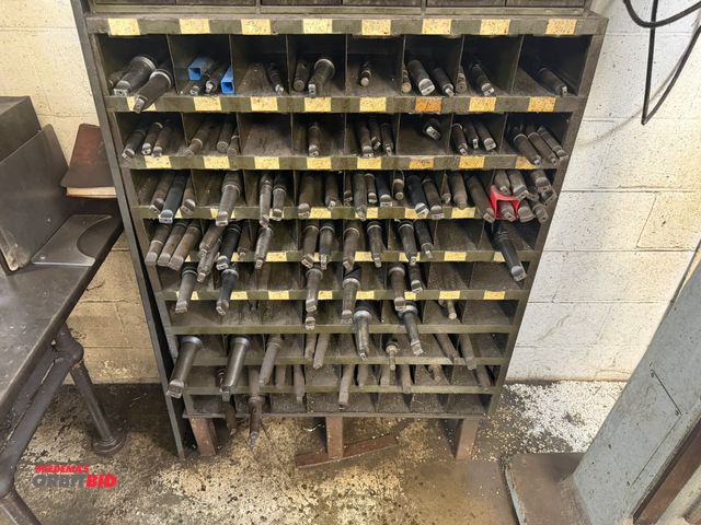 Lot 1-6389 - (1) heavy duty steel drill slot cabinet, approx. 35.5" x 13" deep x 50" tall, includes a large assor...