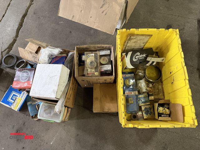 Lot 1-1121 - Large lot of assorted old new stock parts, includes various automotive lamp bulbs, (1) set of OES Sp...