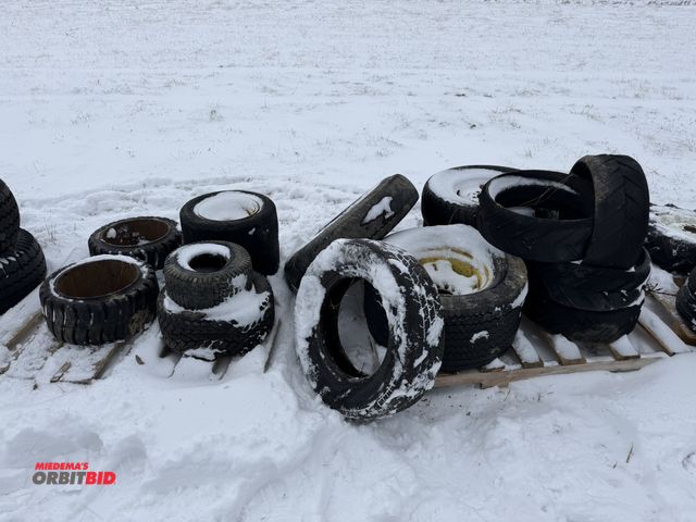 Lot 1-11665 - Lot of approx. (12) assorted tires, includes (2) solid 18 x 8 x 12 1/8" tires, (1) 7.5-16ST tire mou...