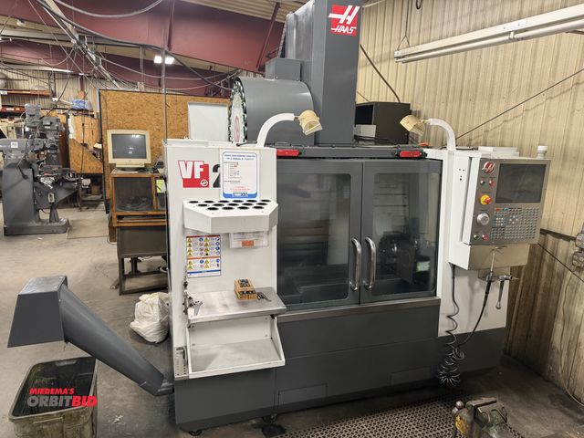 Lot 1-1637 - 2013 Haas VF-2 CNC Vertical Machining Center 20-HP, 5-Axis Capable, 8000-RPM, 16" x 36" T-Slot Table...