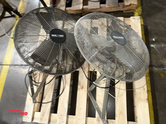 Lot 1-5343 - Lot of (2) Maxess, 120V, single phase post mount fans with approx. 26" diameter cages and 3 blades, ...
