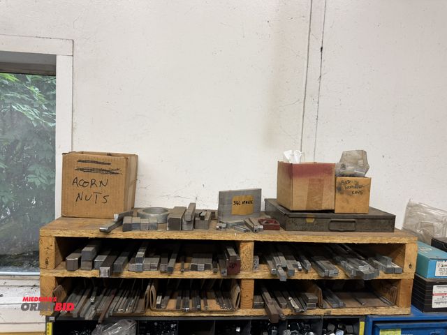 Lot 1-6407 - (1) 41" width x 9" height x 12" depth wood storage unit with assorted size Make-a-Key blanks, stainl...