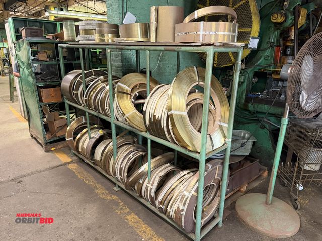 Lot 1-18665 - (1) 8' length x 64" height x 16" depth, 3-tier rack full of assorted rolls of brass material, all ma...