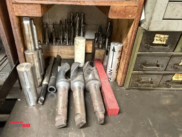 Lot 1-6384 - Large lot of assorted end mills, heavy duty drill bits, tool holders, and more.