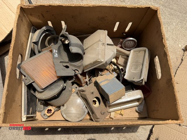 Lot 1-8568 - Large lot of assorted GM parts, includes side markers, lenses, and more.