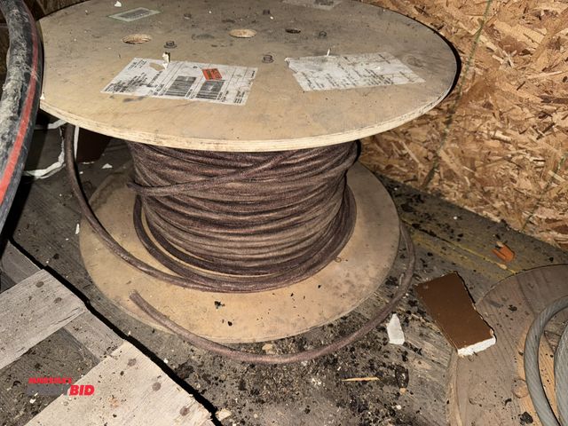 Lot 1-4297 - (1) partial spool of 12/3 conductor STR RBR insulated copper wiring.