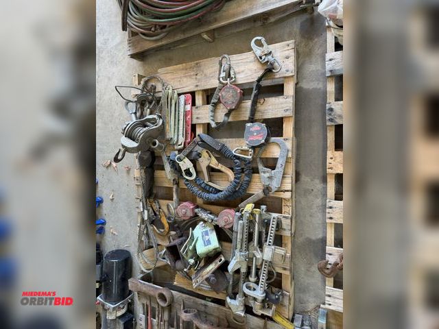 Lot 1-1415 - (1) skid of assorted balancers, (1) heavy duty Bee Bee Brothers steel wire type come along, various ...