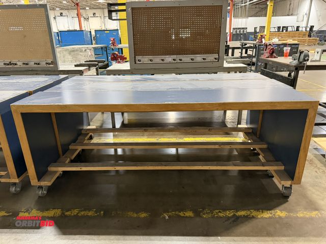 Lot 1-5242 - Set of (3) matching 8' length x 36" height x 18" depth rolling wood tables.