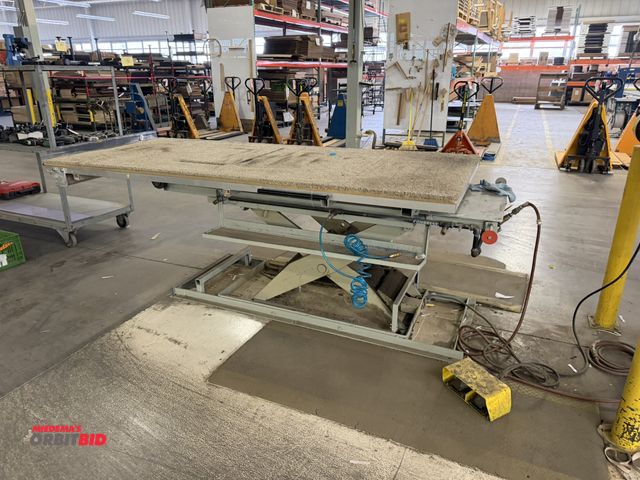 Lot 1-17673 - (1) 2000 lb. capacity lift, foot pedal controls, tilting aluminum frame table bed, approx. 100" leng...