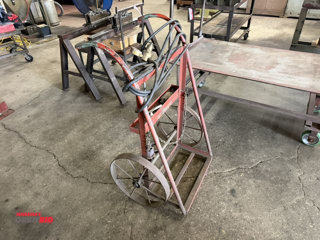 Lot 1-6428 - (1) oxygen/acetylene tank cart with approx. 15' of hose, 18" diameter x 2" wide steel wheels.