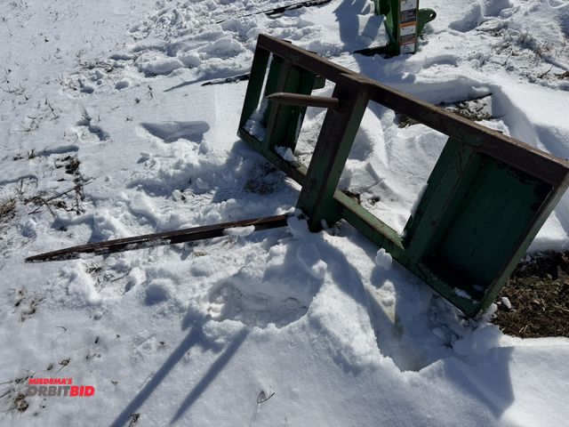 Lot 1-11588 - (1) 2-tine bale spear, top tine is 33" long, loader tractor attachment brackets are approx. 40" on c...