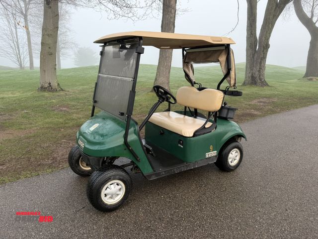 Lot 1-19336 - (1) 2015 E-Z-Go golf cart with a Kawasaki gas engine, includes canopy, ball cover, club cover, fold-...