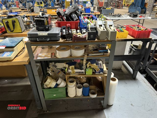 Lot 1-18843 - Large lot of assorted office supplies, includes tape guns, tape dispensers, hand staplers, assorted ...
