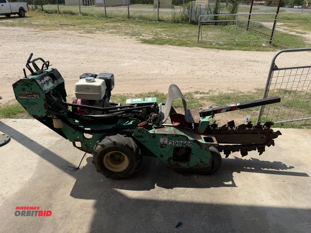 Lot 1-9599 - (1) 2012 Ditch Witch RT10 wheel mounted chain trencher, walk-behind type, has Honda GX340 gas engine...