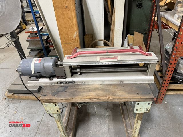 Lot 1-18696 - (1) Van Mark Trim-A-Slitter, model M24B, S/N 20789, with Dayton 115V, electric motor, mounted on rol...