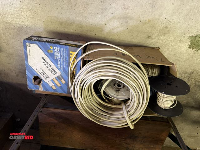 Lot 1-12325 - Large lot of assorted wire, includes partial coil of 12:2, partial coil of 14:3, aluminum flex coil,...