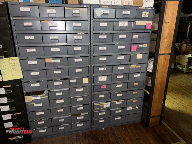 Lot 1-4779 - Lot of (2) 36-drawer organizers, 36" wide x 25" deep x 75 3/4" tall, includes assorted medical brace...