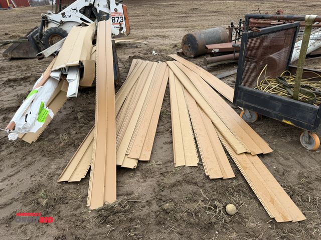 Lot 1-3007 - Lot of assorted vinyl siding, includes steel cart.