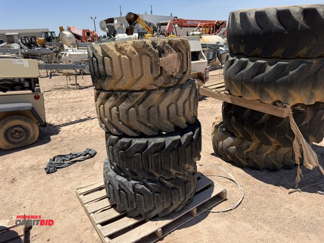 Lot 1-18238 - (4) Outrigger 355/55D625 tires on 9-bolt rim, tires are used