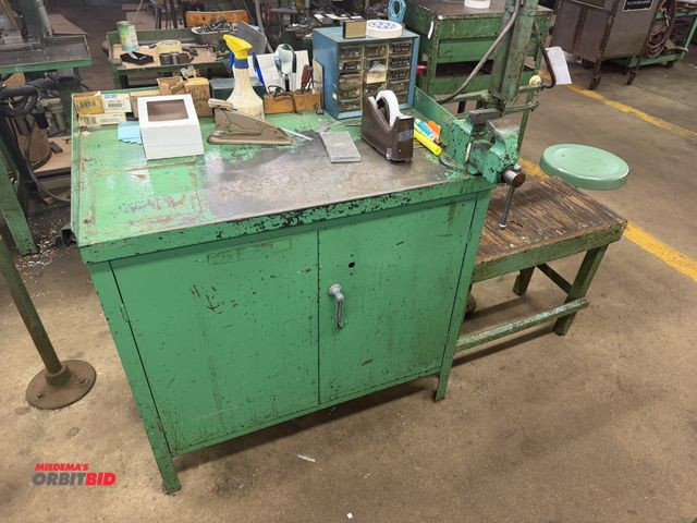 Lot 1-18726 - (1) 36" width x 34" height x 24" depth 2-door steel cabinet with a mounted 2.5" bench vise, and misc...