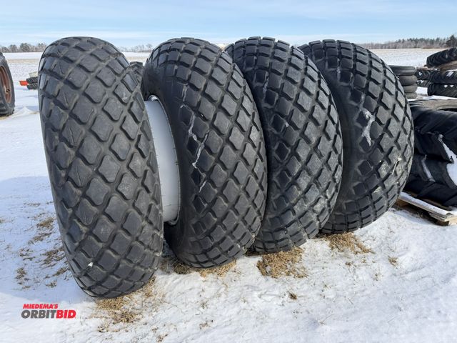Lot 1-11616 - Lot of (2) sets of BKT Industrial tractor turf tires, size 16.9-30R3, mounted on 8-bolt rims.