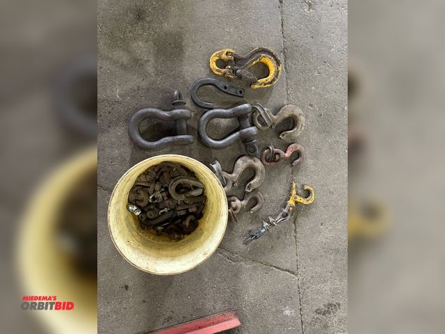 Lot 1-1127 - Large lot of assorted large hooks, shackles, and wire clamps.