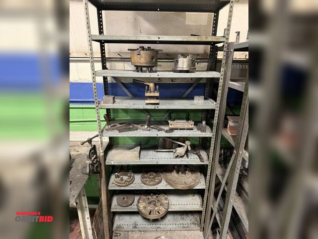 Lot 1-18586 - (1) rack with assorted lathe parts, includes 12" face plate, 14" face plate, 8" 3-jaw chuck, 6" 4-ja...