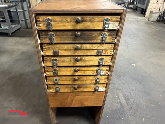 Lot 1-12388 - (1) 20" width x 48" height x 16" depth wood cabinet with (7) sets of pin gauges, some are incomplete...